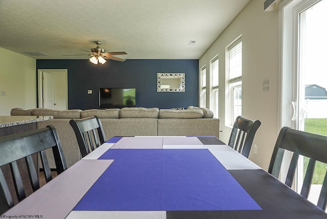 dining room featuring a ceiling fan