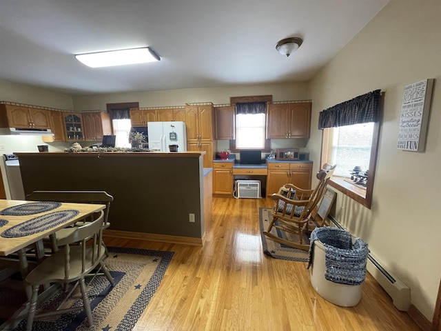 155 E St, Masontown, WV 26542 - kitchen featuring white refrigerator with ice dispenser, light wood finished floors, a baseboard heating unit, brown cabinetry, and glass insert cabinets