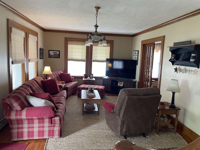 155 E St, Masontown, WV 26542 - living room featuring a textured ceiling, wood finished floors, and ornamental molding