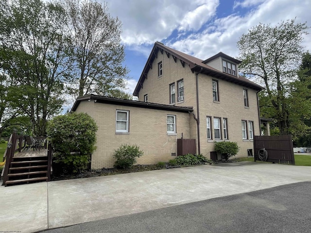 155 E St, Masontown, WV 26542 - view of side of property with a deck and brick siding