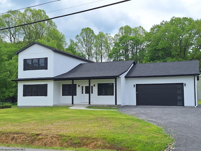 794 Laurel Park Rd, Clarksburg, WV 26301 - modern farmhouse featuring a garage, a front lawn, driveway, covered porch, and a shingled roof