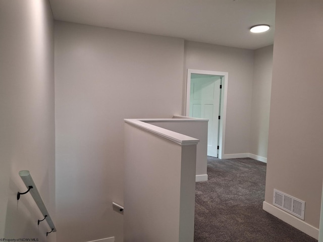 794 Laurel Park Rd, Clarksburg, WV 26301 - corridor featuring an upstairs landing, dark colored carpet, and baseboards