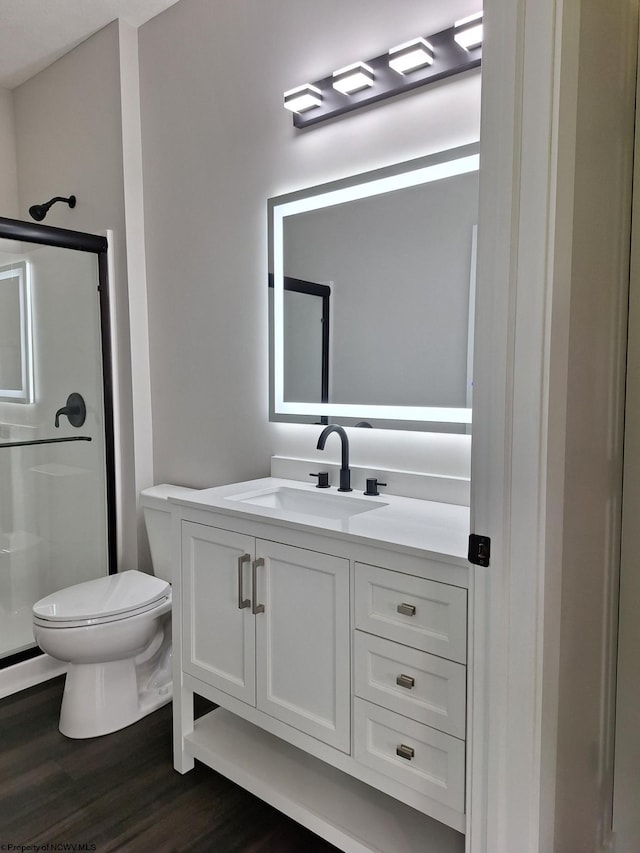 794 Laurel Park Rd, Clarksburg, WV 26301 - bathroom with a stall shower, toilet, vanity, and wood finished floors