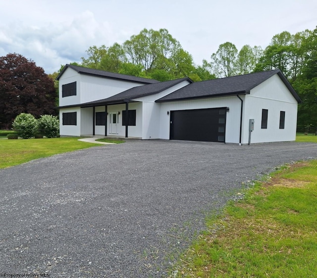 794 Laurel Park Rd, Clarksburg, WV 26301 - modern farmhouse featuring an attached garage and a front lawn