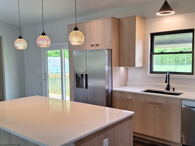 794 Laurel Park Rd, Clarksburg, WV 26301 - kitchen featuring stainless steel appliances, a sink, a center island, decorative light fixtures, and light stone countertops