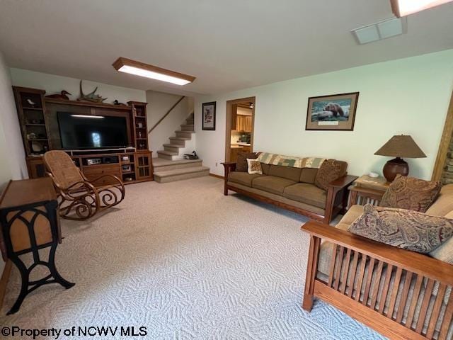 677 Dylan Rd, Elkins, WV 26241 - carpeted living area featuring stairs