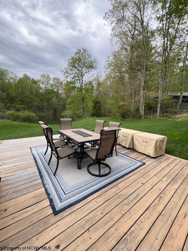 677 Dylan Rd, Elkins, WV 26241 - wooden terrace with outdoor dining area and a lawn