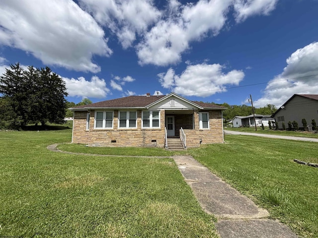 29 Dan St, Hepzibah, WV 26369 - view of front facade with stone siding and a front yard