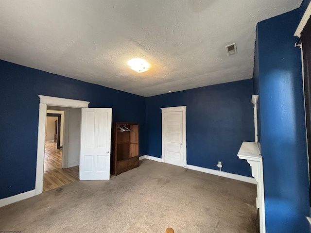 29 Dan St, Hepzibah, WV 26369 - unfurnished bedroom with carpet, baseboards, and a textured ceiling
