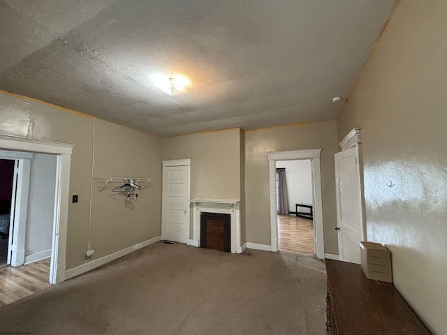 29 Dan St, Hepzibah, WV 26369 - unfurnished living room with a fireplace, carpet flooring, and baseboards