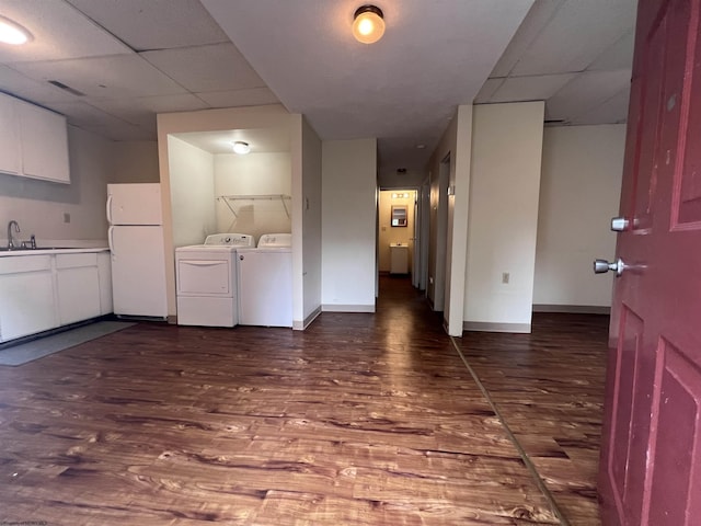 409 Forest Ave Unit 2, Morgantown, WV 26505 - laundry area featuring washing machine and clothes dryer, wood finished floors, and baseboards