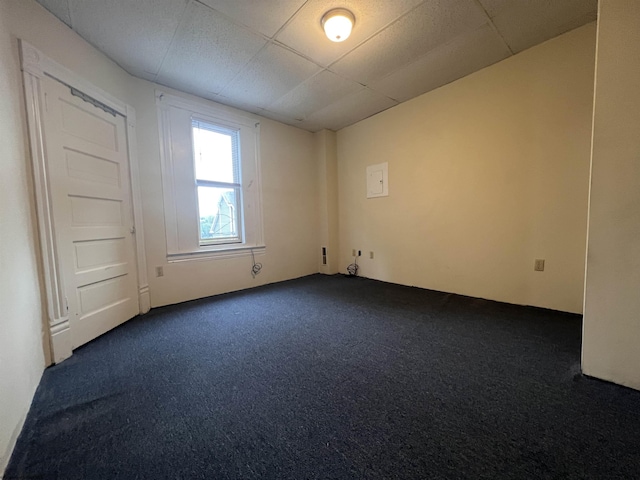 409 Forest Ave Unit 2, Morgantown, WV 26505 - spare room featuring dark carpet and a paneled ceiling
