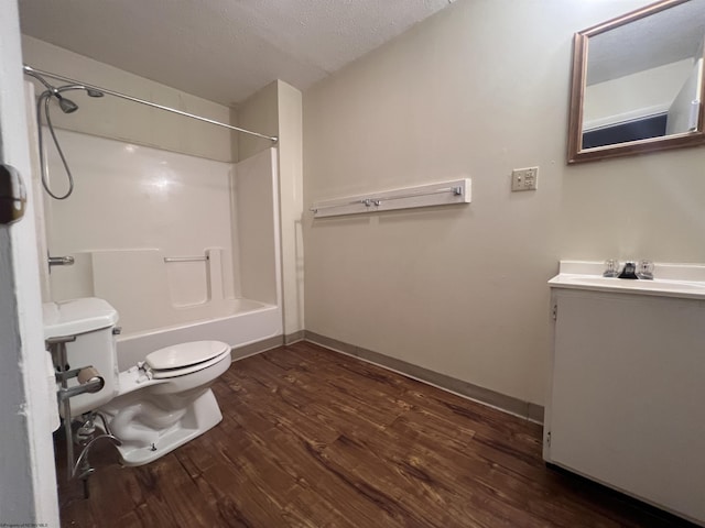 409 Forest Ave Unit 2, Morgantown, WV 26505 - full bathroom with toilet, wood finished floors, vanity, bathtub / shower combination, and baseboards