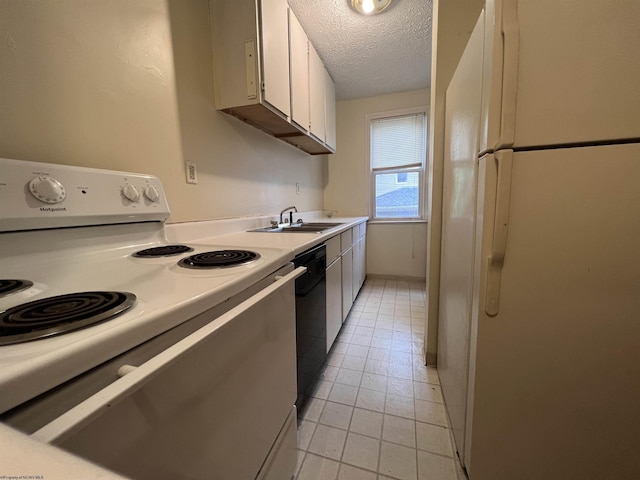 409 Forest Ave Unit 2, Morgantown, WV 26505 - kitchen featuring white appliances, a sink, light countertops, a textured ceiling, and light tile patterned flooring
