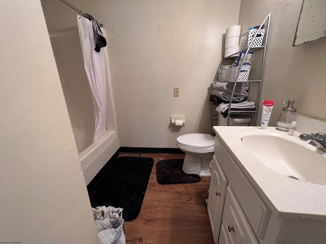 417 Forest Ave Unit 2, Morgantown, WV 26505 - bathroom with toilet, wood finished floors, and vanity