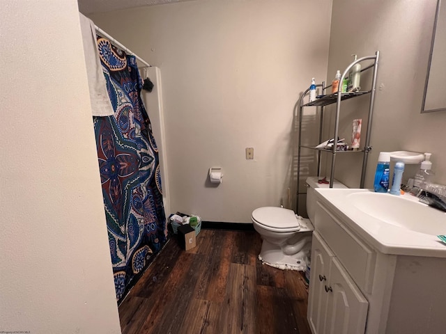 417 Forest Ave Unit 2, Morgantown, WV 26505 - full bathroom featuring wood finished floors, vanity, toilet, and a shower with curtain