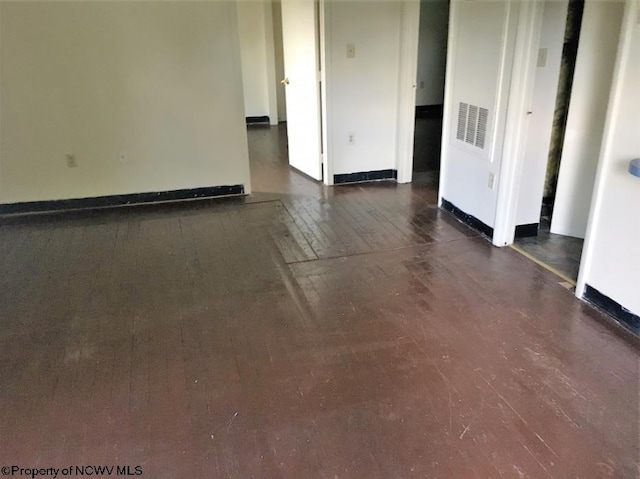 417 Forest Ave Unit 2, Morgantown, WV 26505 - unfurnished room featuring baseboards and dark wood-type flooring
