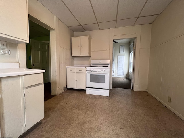 445 Baird St Unit 4, Morgantown, WV 26505 - kitchen with white range with gas cooktop, light countertops, white cabinetry, a paneled ceiling, and a ceiling fan