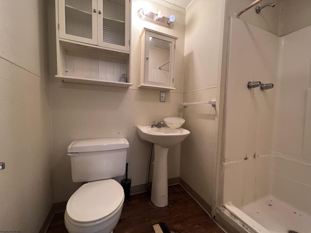 445 Baird St Unit 4, Morgantown, WV 26505 - bathroom featuring a shower stall, wood finished floors, toilet, and baseboards