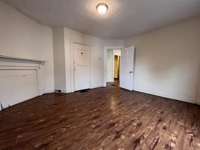 445 Baird St Unit 4, Morgantown, WV 26505 - unfurnished living room with wood finished floors and baseboards