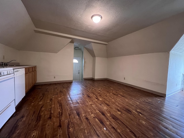 445 Baird St Unit 4, Morgantown, WV 26505 - additional living space featuring a sink, lofted ceiling, dark wood-type flooring, a textured ceiling, and baseboards