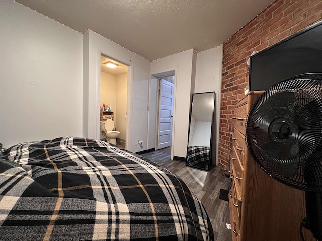 445 Baird St Unit 4, Morgantown, WV 26505 - bedroom featuring dark wood-style floors and brick wall