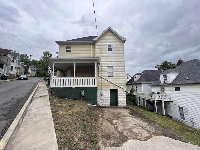 view of front of home with a residential view