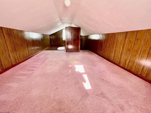 303 Morgantown St, Kingwood, WV 26537 - additional living space featuring wooden walls, vaulted ceiling, and carpet flooring