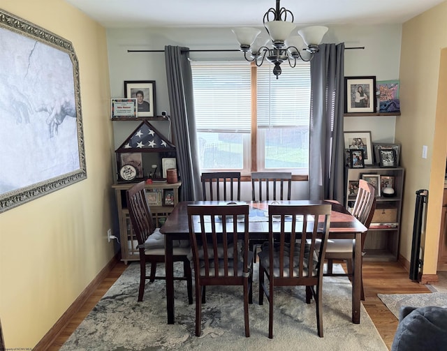 1423 Brushy Fork Rd, Buckhannon, WV 26201 - dining room featuring plenty of natural light, a chandelier, and wood finished floors