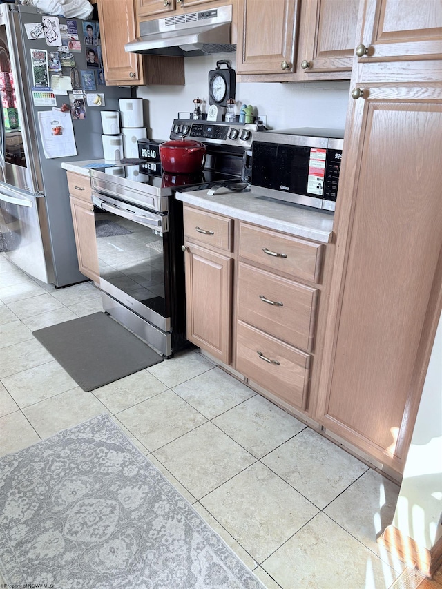 1423 Brushy Fork Rd, Buckhannon, WV 26201 - kitchen with appliances with stainless steel finishes, under cabinet range hood, light countertops, and light tile patterned flooring