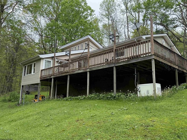 4253 Point Mountain Rd, Monterville, WV 26282 - back of house featuring a deck and a lawn