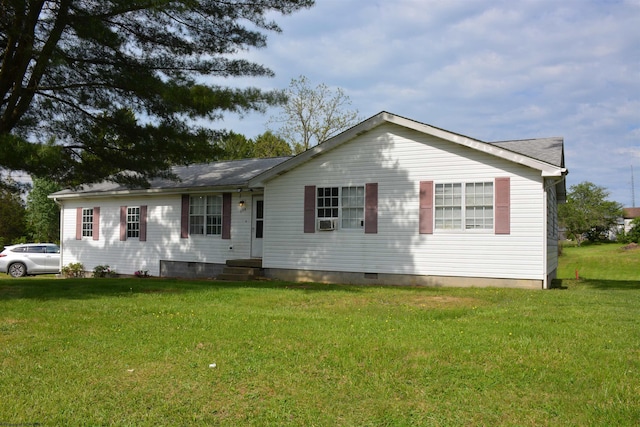single story home featuring crawl space, a front yard, and cooling unit