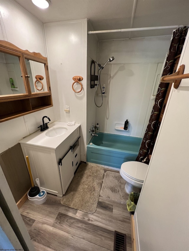 302 Jameson Ave, Parsons, WV 26287 - bathroom featuring wood finished floors, vanity, toilet, and shower / tub combo with curtain