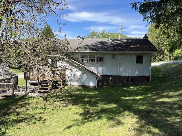 302 Jameson Ave, Parsons, WV 26287 - back of property featuring a wooden deck, a yard, and a shingled roof