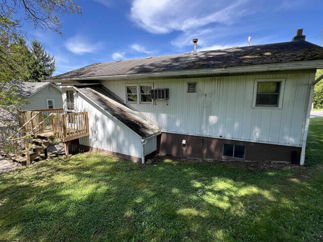 302 Jameson Ave, Parsons, WV 26287 - back of house with a yard, a deck, a wall mounted air conditioner, and a shingled roof