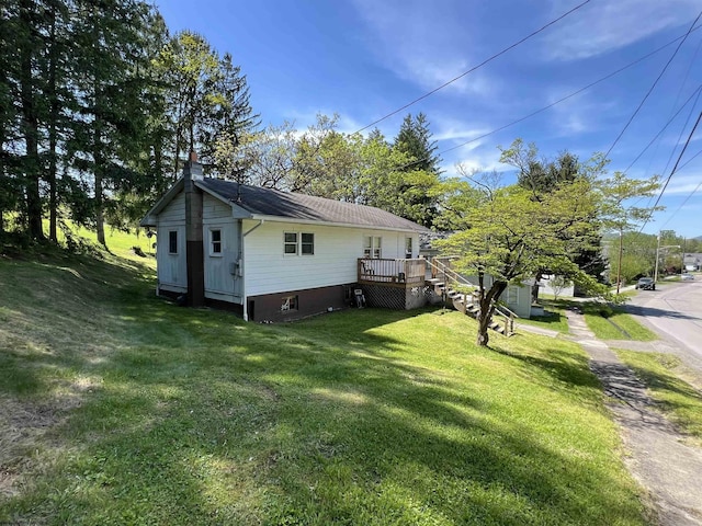 302 Jameson Ave, Parsons, WV 26287 - view of home's exterior with a yard, a deck, and stairs