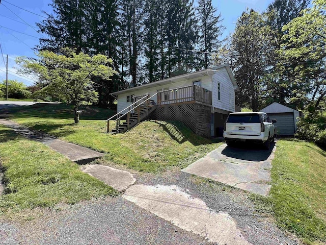 302 Jameson Ave, Parsons, WV 26287 - view of front facade with stairs, a front yard, a deck, and a detached garage