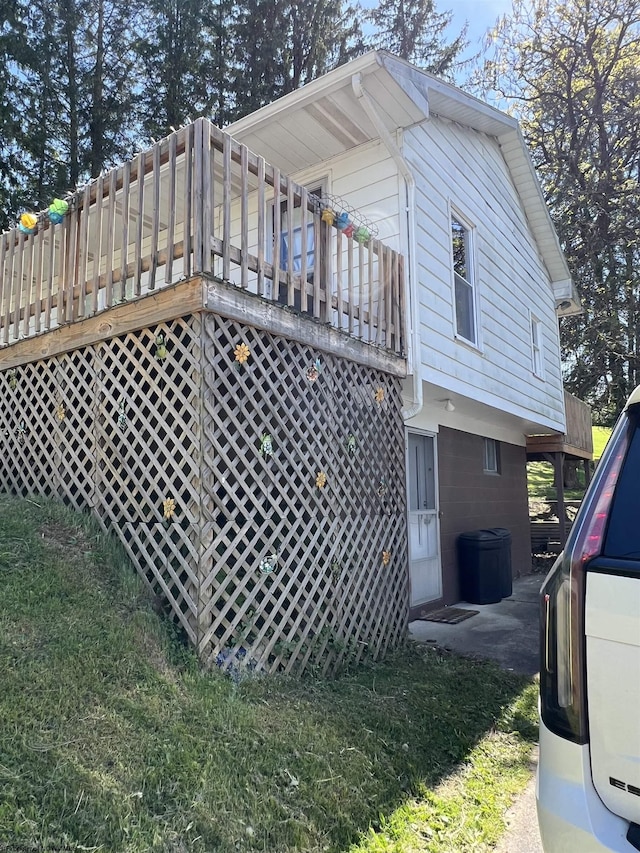 302 Jameson Ave, Parsons, WV 26287 - view of home's exterior featuring a deck and a yard
