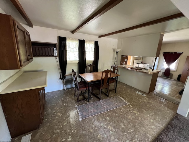 302 Jameson Ave, Parsons, WV 26287 - dining space featuring beamed ceiling and plenty of natural light