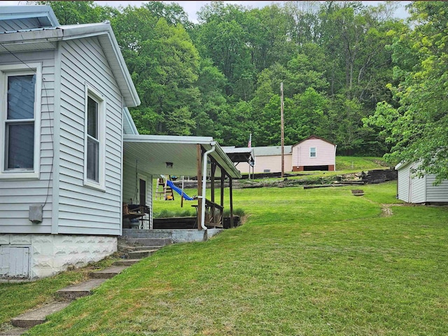 784 Ona St, Grafton, WV 26354 - view of grassy yard featuring an outdoor structure