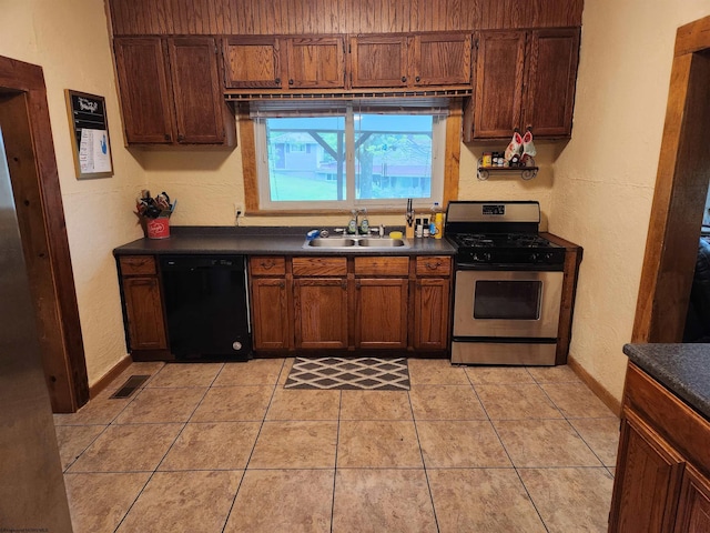 784 Ona St, Grafton, WV 26354 - kitchen featuring black dishwasher, stainless steel gas stove, a sink, dark countertops, and a textured wall