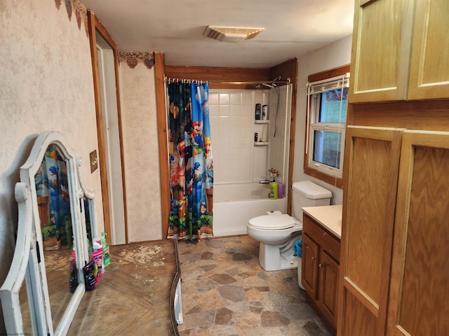 784 Ona St, Grafton, WV 26354 - bathroom featuring stone finish floors, toilet, shower / bathtub combination with curtain, and vanity