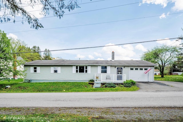 22 N Euclid Ave, Thomas, WV 26292 - single story home featuring driveway, a garage, and a chimney