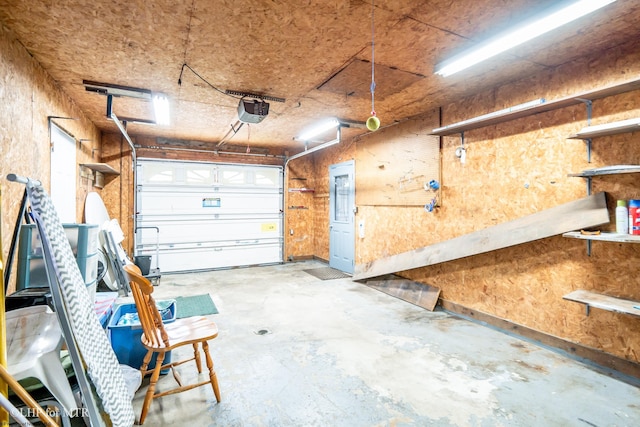 22 N Euclid Ave, Thomas, WV 26292 - garage featuring a workshop area and a garage door opener