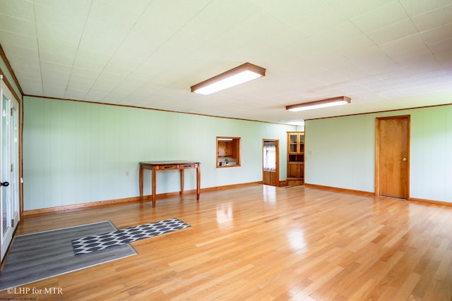 22 N Euclid Ave, Thomas, WV 26292 - spare room featuring light wood finished floors, crown molding, and baseboards