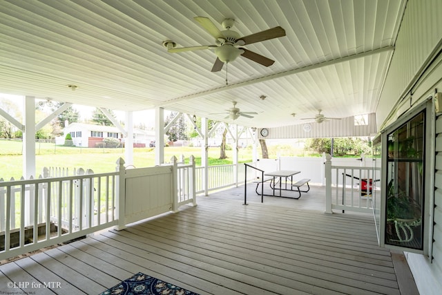 22 N Euclid Ave, Thomas, WV 26292 - deck featuring a ceiling fan, a yard, outdoor dining area, and covered porch
