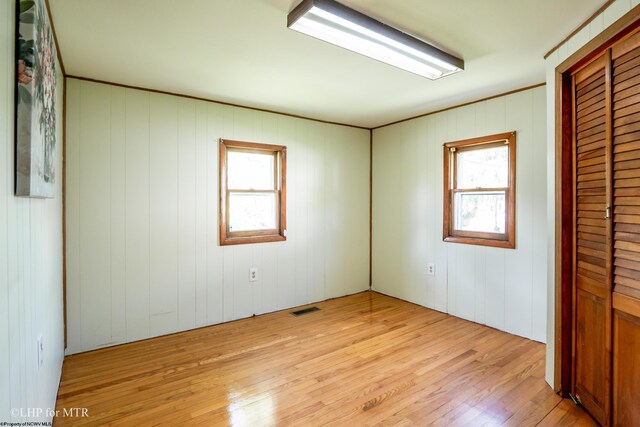 22 N Euclid Ave, Thomas, WV 26292 - unfurnished bedroom featuring light wood-style flooring and a closet