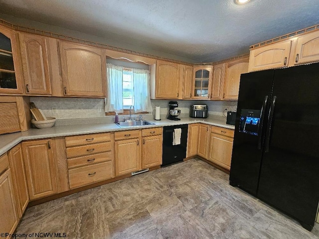 760 Skelton Run, Wallace, WV 26448 - kitchen with black appliances, a sink, glass insert cabinets, light countertops, and light brown cabinetry