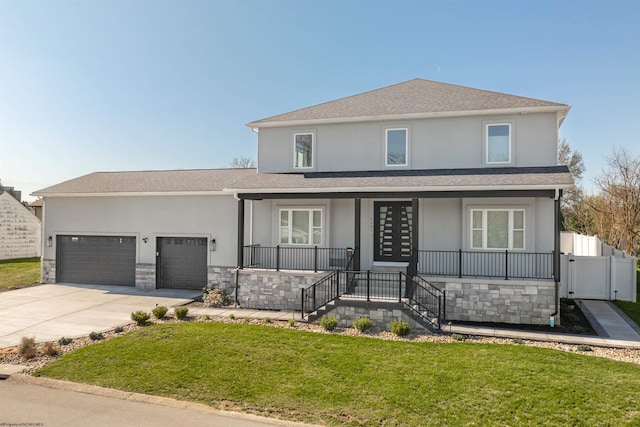 view of front of house with stucco siding, covered porch, concrete driveway, a garage, and a gate