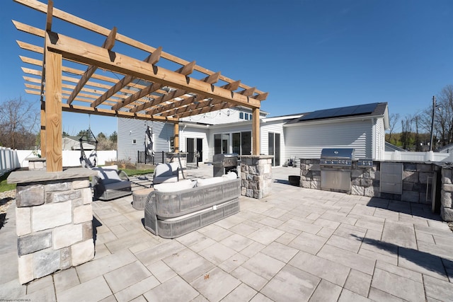 view of patio featuring area for grilling, a pergola, grilling area, and a fenced backyard